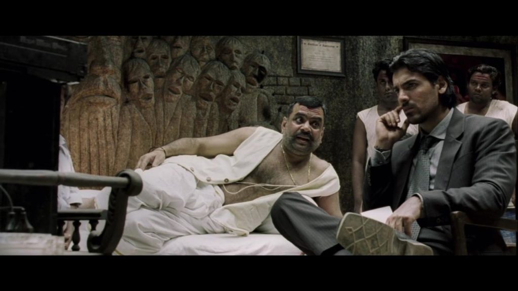 Paresh Rawal and John Abraham in No Smoking (2007)-cinemabaaz.xyz