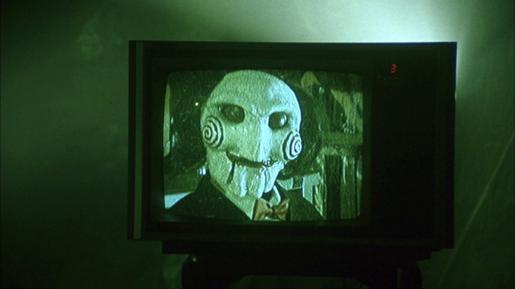 Tobin Bell in Saw (2004)-cinemabaaz.xyz